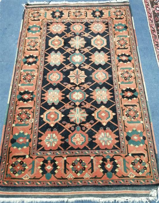 A Caucasian blue ground rug 150 x 90cm